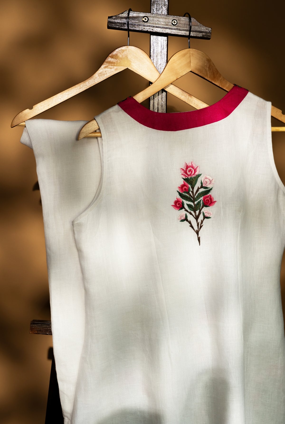 Rose Aura White Set Sleeveless A-line Kurta and Ankle Length Pant
