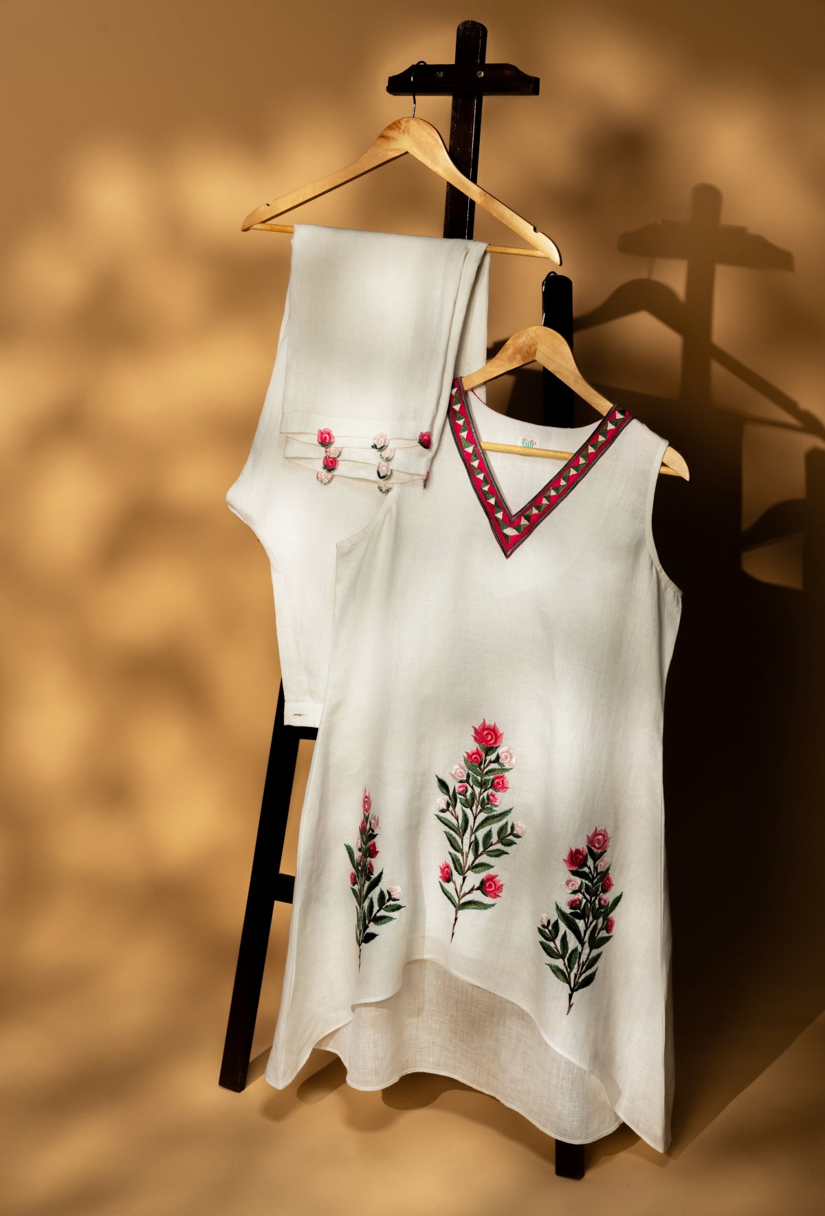 Rose Aura White Set Sleeveless A-line Kurta and Ankle Length Pant