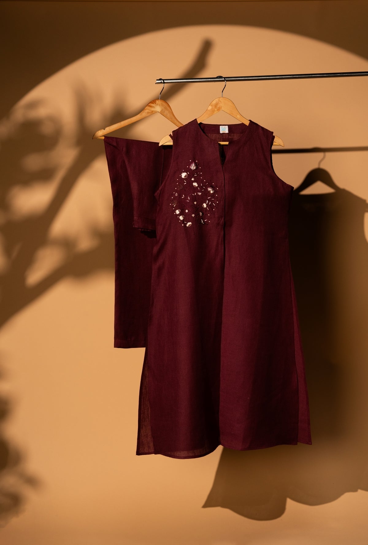 Wine Ember Set Three Piece Co-ord features a Long Sleeveless Jacket, Spaghetti and Wide Legged Palazzo Pants